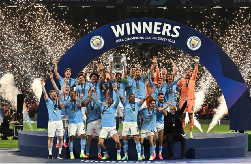 Home 158 Manchester City's captain Ilkay Gundogan holds aloft the European Cup trophy as they celebrate winning the UEFA Champions League final football match between Inter Milan and Manchester City at the Ataturk Olympic Stadium in Istanbul, on June 10, 2023.