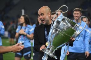 Home 6 Manchester City's Spanish manager Pep Guardiola celebrates winning the UEFA Champions League final football match between Inter Milan and Manchester City at the Ataturk Olympic Stadium in Istanbul, on June 10, 2023.