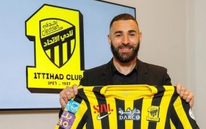 France international Karim Benzema smiles with a football jersey after official joining Al-Ittihad of Saudi Arabia on Tuesday 6th June 2023.
