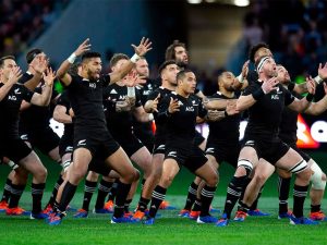 New Zealand (All Blacks) players perform the haka, a famous Maori war dance, before each match.