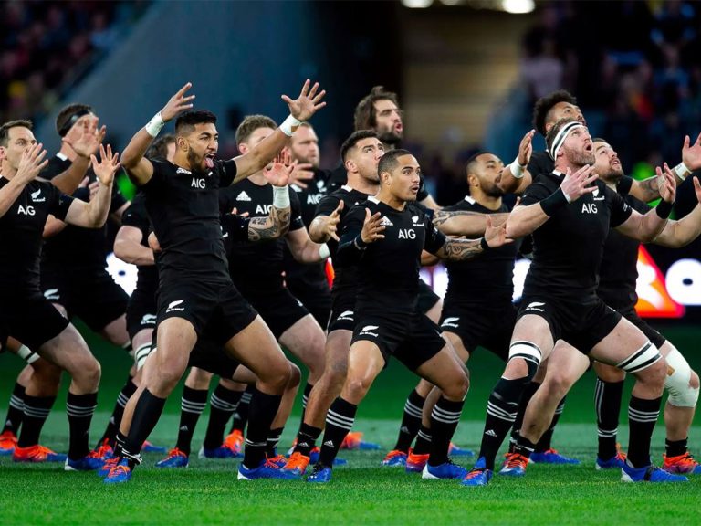New Zealand (All Blacks) players perform the haka, a famous Maori war dance, before each match.