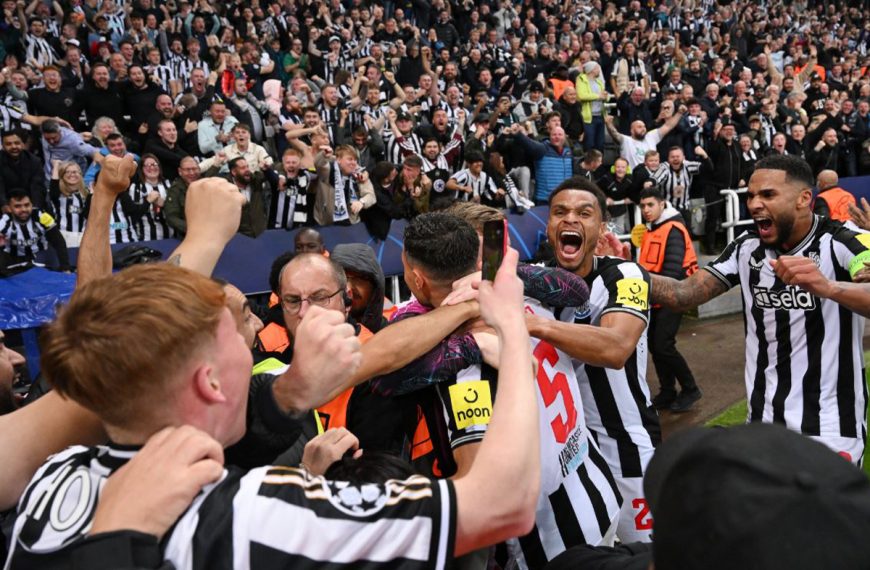 Newcastle United players celebrate a goal during their UEFA Champions League match against PSG on 4 October 2023.