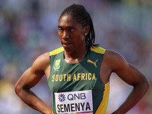 Home 8 Caster Semenya of team South Africa reacts following an announcement before a race.
