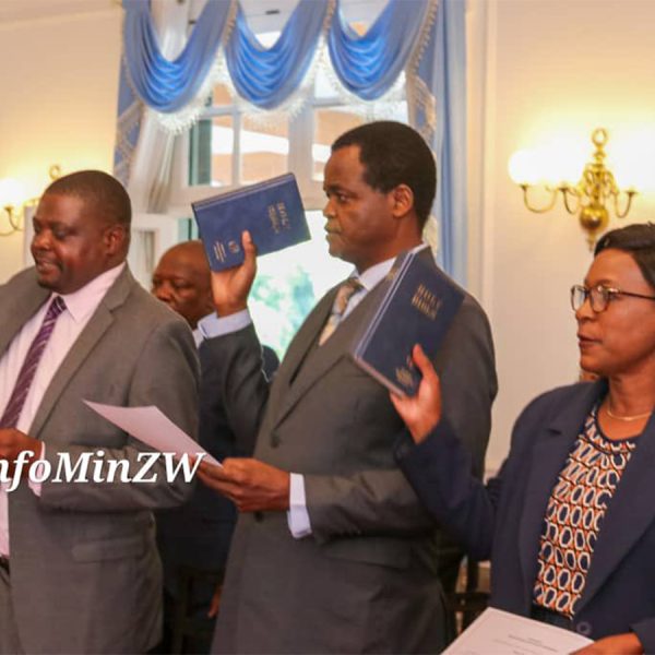 Three new members of the Zimbabwe Gender Commission, namely: Walter Tonderai Mufuka; Angelina Vere and Jigu Katsande are seen in this photo holding Bibles during the swearing in ceremony on 6th November 2023.