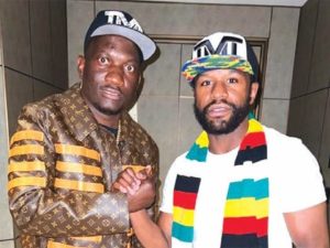Home 7 Zanu PF apologist Scott Sakupwanya with Floyd Mayweather after inviting him to Zimbabwe to assess investment prospects.