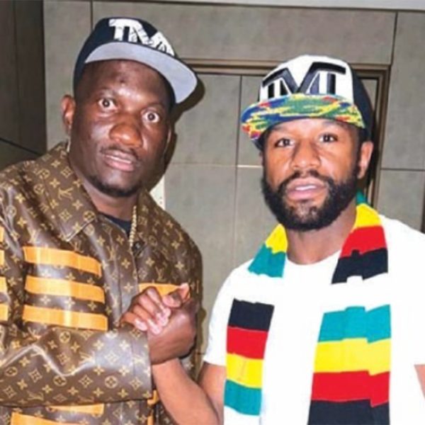 Zanu PF apologist Scott Sakupwanya with Floyd Mayweather after inviting him to Zimbabwe to assess investment prospects.