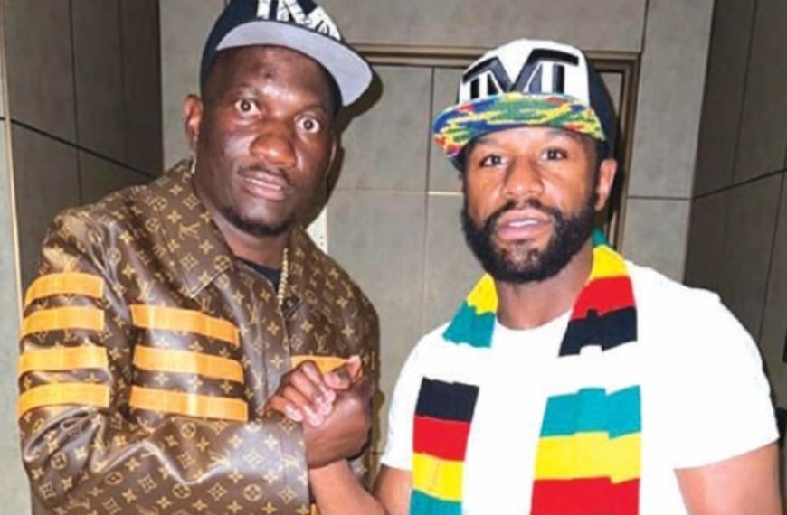 Zanu PF apologist Scott Sakupwanya with Floyd Mayweather after inviting him to Zimbabwe to assess investment prospects.