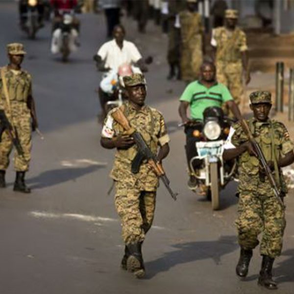 Ugandan army soldiers in downtown Kampala, Uganda, Saturday, Feb. 20, 2016.