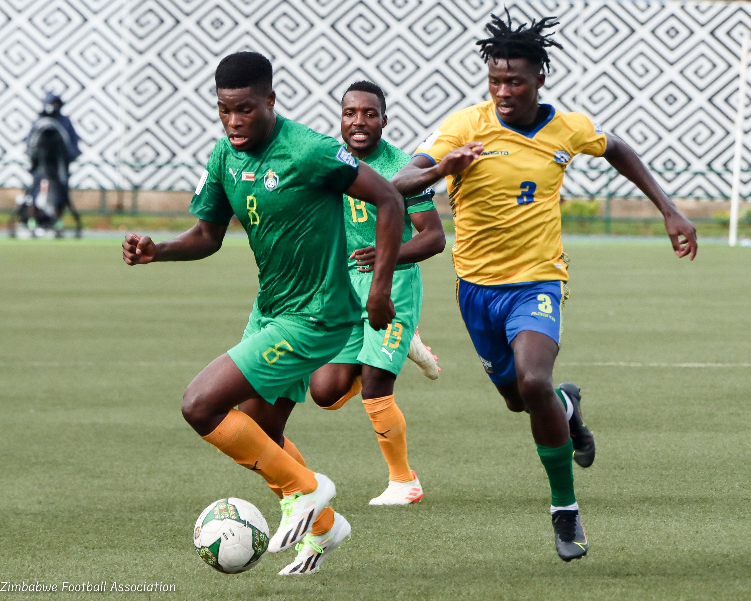 Zimbabwe international Marshall Munetsi tussles for the ball with Rwandese player during a 2026 FIFA World Cup qualifiers Group C encounter played at Huye Stadium on 15th November 2023.