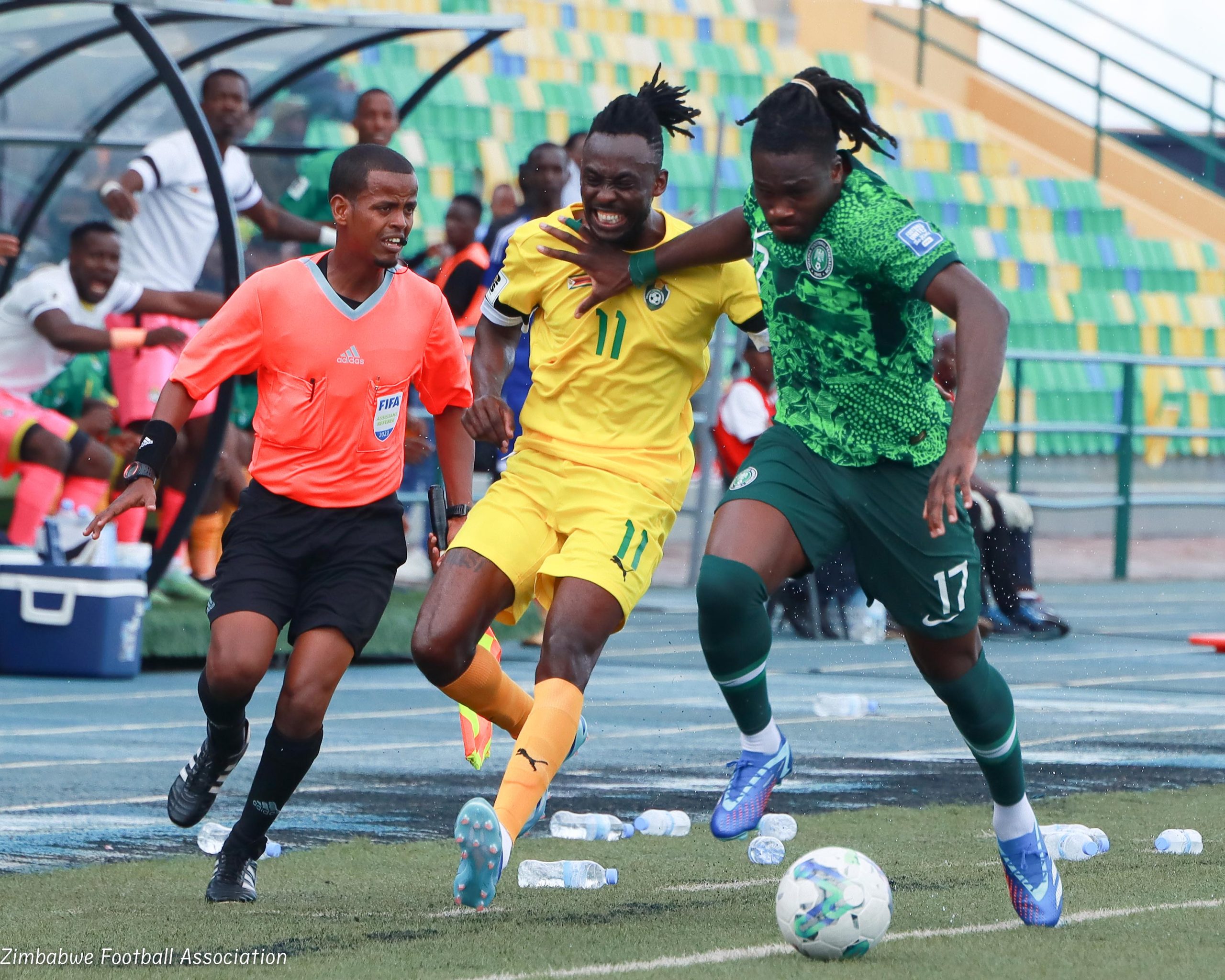Zimbabwe national team player Tino Kadewere tussles for the ball with Super Eagles star during the 2026 FIFA World Cup match between Zimbabwe and Nigeria at Huye Stadium in Butare, Rwanda on Sunday 19th November 2023.