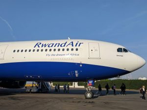 Home 6 Seen in this photo is a RwandAir plane at one airport recently.