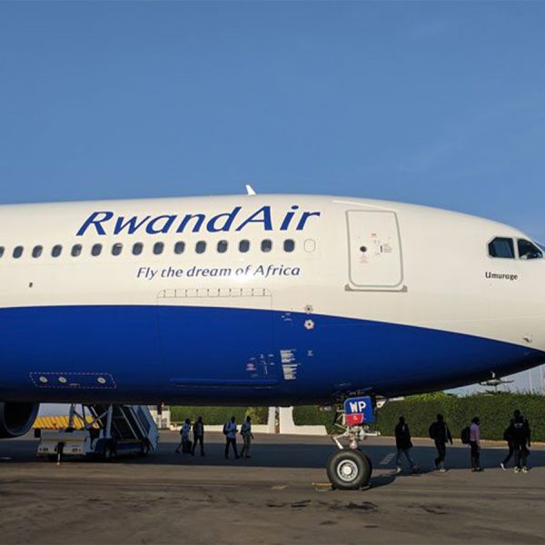 Home 31 Seen in this photo is a RwandAir plane at one airport recently.