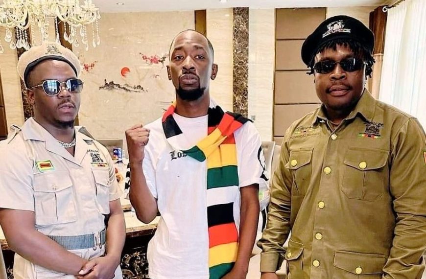 Zimbabwe music stars Poptain Yardbwoy, Holy Ten, Michael Magz pose for a photo clad in Zanu PF regalia