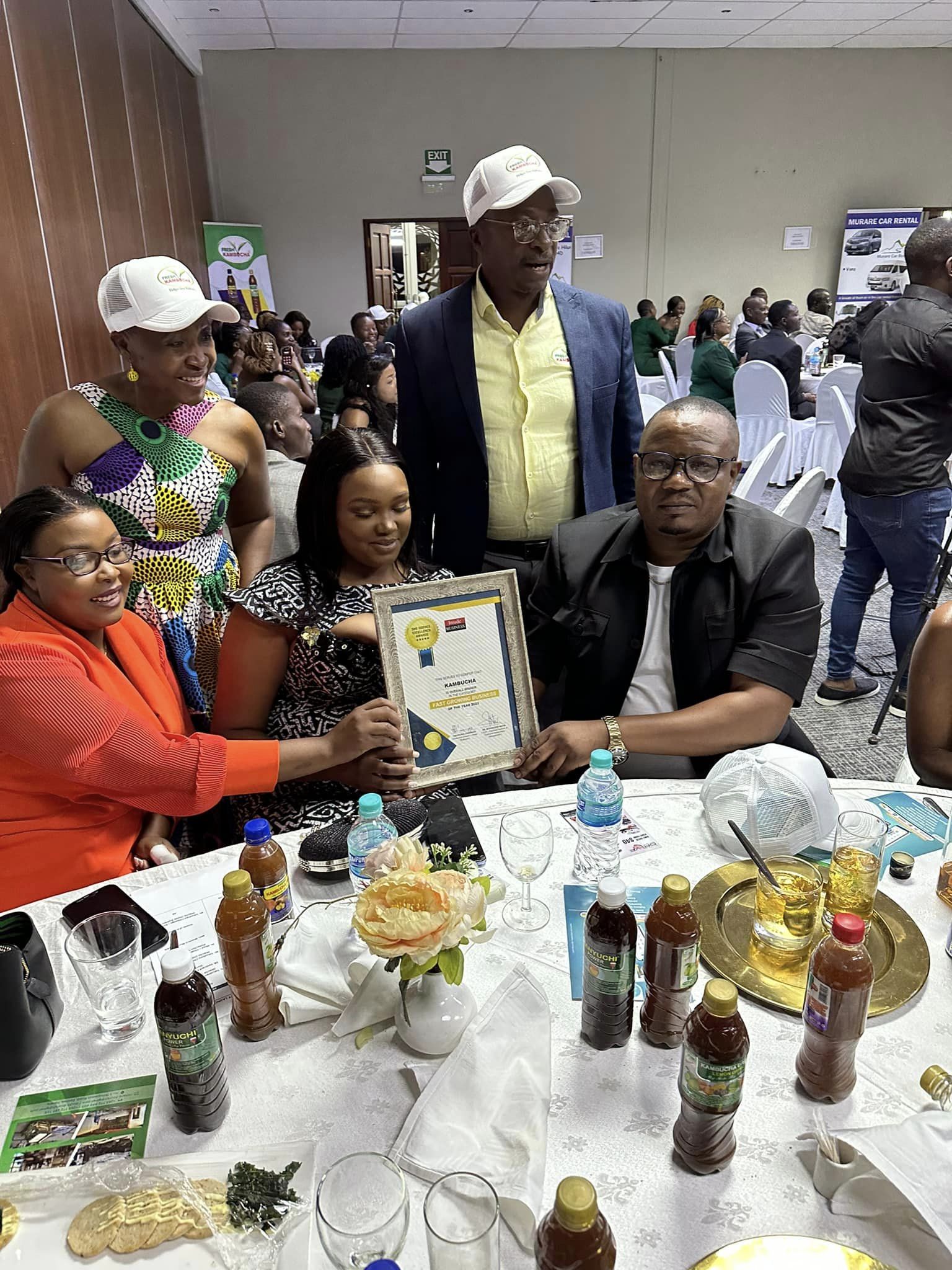 The management team of Fresh Kambucha Pvt Ltd, a local herbal beverages manufacturer, celebrates together after winning a corporate award on 6th December 2023.