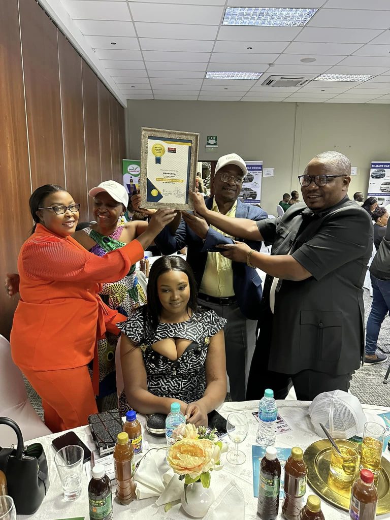 The management team of Fresh Kambucha Pvt Ltd, a local herbal beverages manufacturer, celebrates together after winning a corporate award on 6th December 2023.