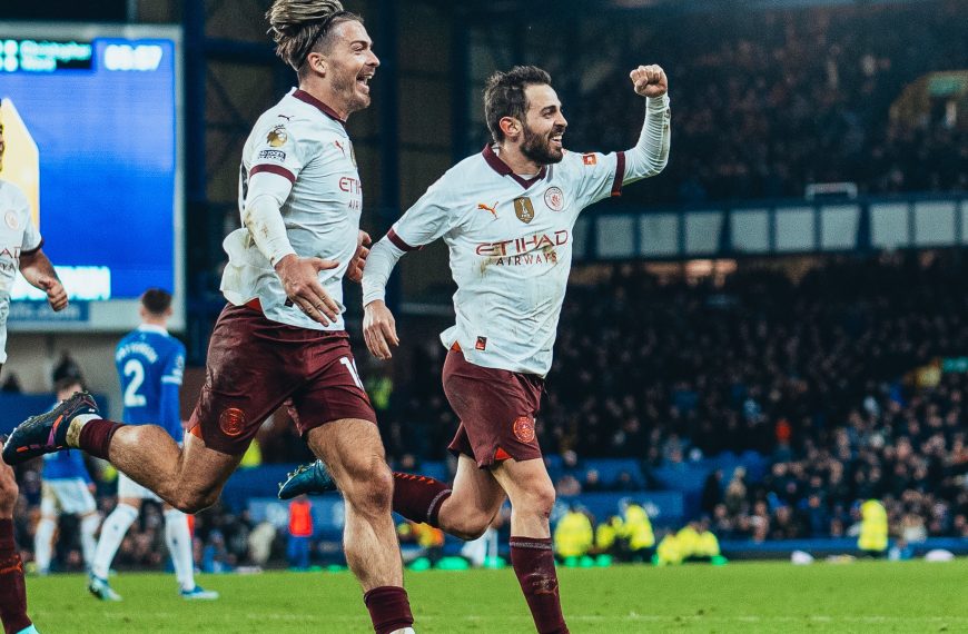 Manchester City players Bernado Silva and Jack Grealish celebrate a goal in their 3-1 win over Everton on 27 December 2023.