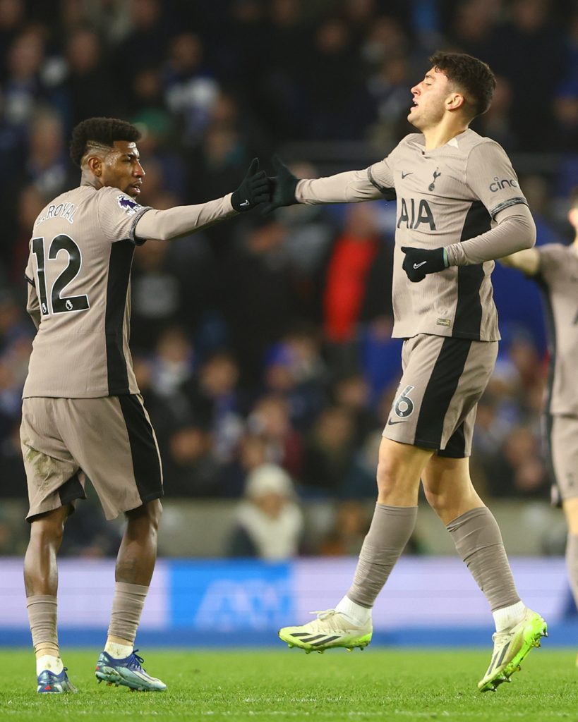 Tottenham players Emmerson Royal and Alejo Veliz celebrate a goal in the 4-2 loss to Brighton and Hove in their English Premier League match on 28 December 2023.