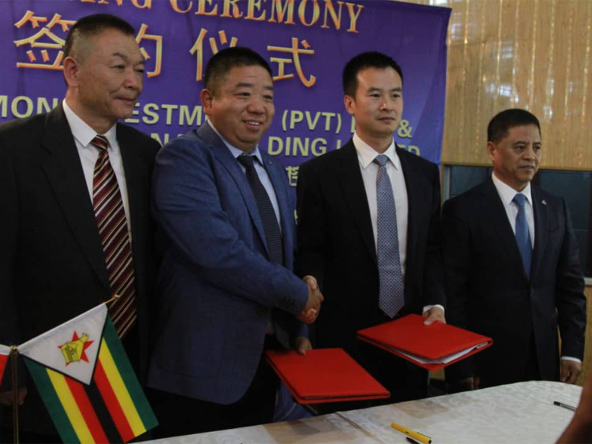 Officials of Chinese firms West International Holding Limited and Labenmon Investors (Pvt) Limited at the signing ceremony.
