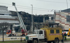 Home 6 Firefighters and municipal employees work at the site after a rocket attack in the city of Dnipro on December 29, 2023, amid the Russian invasion of Ukraine. Russia launched drone and missile strikes across Ukraine on December 29, 2023, killing at least 12 people and wounding over 70 in one of the biggest air attacks of the war. Picture: STRINGER / AFP