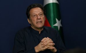 Home 7 Former Pakistan's Prime Minister Imran Khan speaks during an interview with AFP at his residence in Lahore on 18 May 2023.