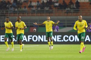 Home 8 Themba Zwane of South Africa celebrates goal with teammates during the 2023 Africa Cup of Nations Finals match between South Africa and Namibia at Amadou Gon Coulibaly Stadium in Korhogo on 21 January 2024 ©Samuel Shivambu/ BackpagePix