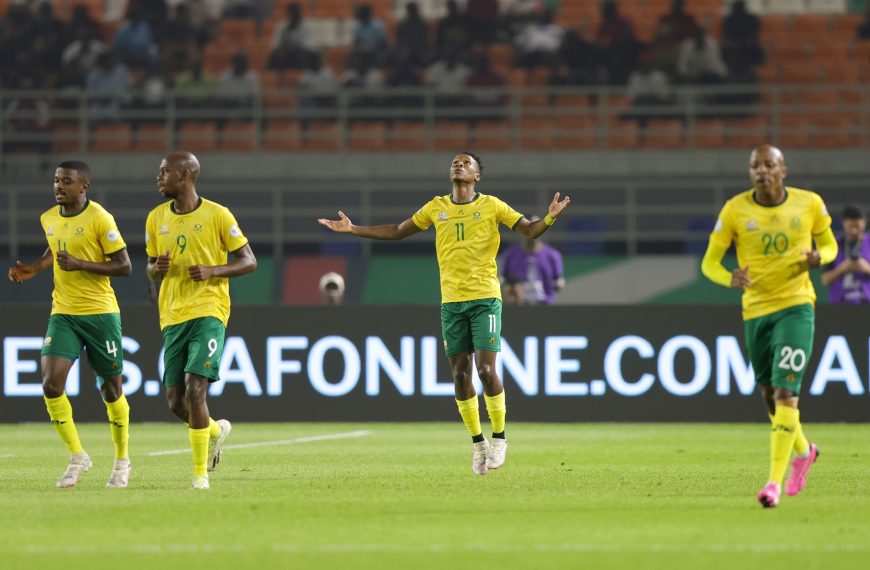 Themba Zwane of South Africa celebrates goal with teammates during the 2023 Africa Cup of Nations Finals match between South Africa and Namibia at Amadou Gon Coulibaly Stadium in Korhogo on 21 January 2024 ©Samuel Shivambu/ BackpagePix
