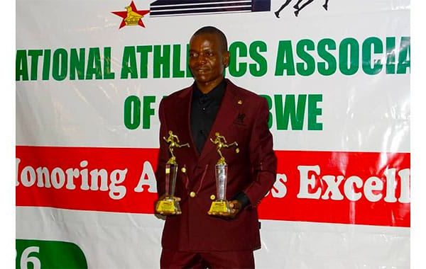 Long distance runner Isaac Mpofu poses for the camera with his awards after being named the 2023 Athlete of the Year at an awards ceremony hosted by the National Athletics Association of Zimbabwe (NAAZ) in Harare on Friday 26th January 2024.