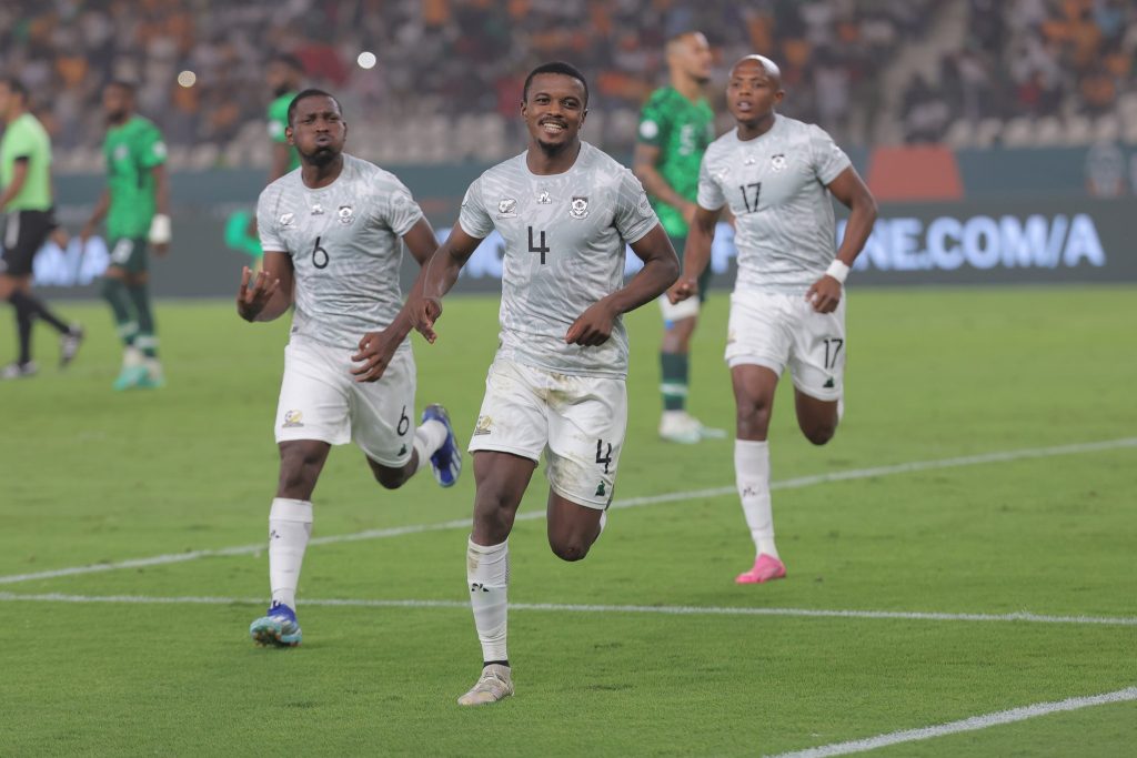 Teboho Mokoena of South Africa celebrates a goal with teammates during the 2023 Africa Cup of Nations Finals match between South Africa and Nigeria in Ivory Coast on 7 February 2024 ©Samuel Shivambu/ BackpagePix