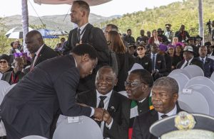 Zambian President Hakainde Hichilema greets Zimbabwe's President Emmerson Mnangagwa while South African president Cyril Ramaphosa looks on at the burial of the late former President of Namibia, His Excellency Dr. Hage Gottfried Geingob, at Heroes Square in Windhoek on Sunday 25th February 2024.