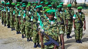 African Union (AMISOM) soldiers from Burundi stand to attention in Mogadishu on July 11, 2017.