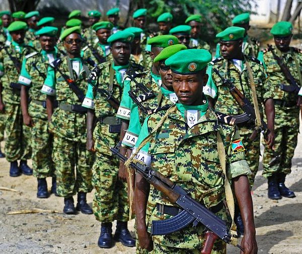 African Union (AMISOM) soldiers from Burundi stand to attention in Mogadishu on July 11, 2017.