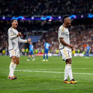 Home 8 Real Madrid forward Vinicius Junior celebrates with teammate Jude Bellingham after scoring against RB Leipzig in a Champions League match played on Wednesday 6th March 2024 in Madrid, Spain.