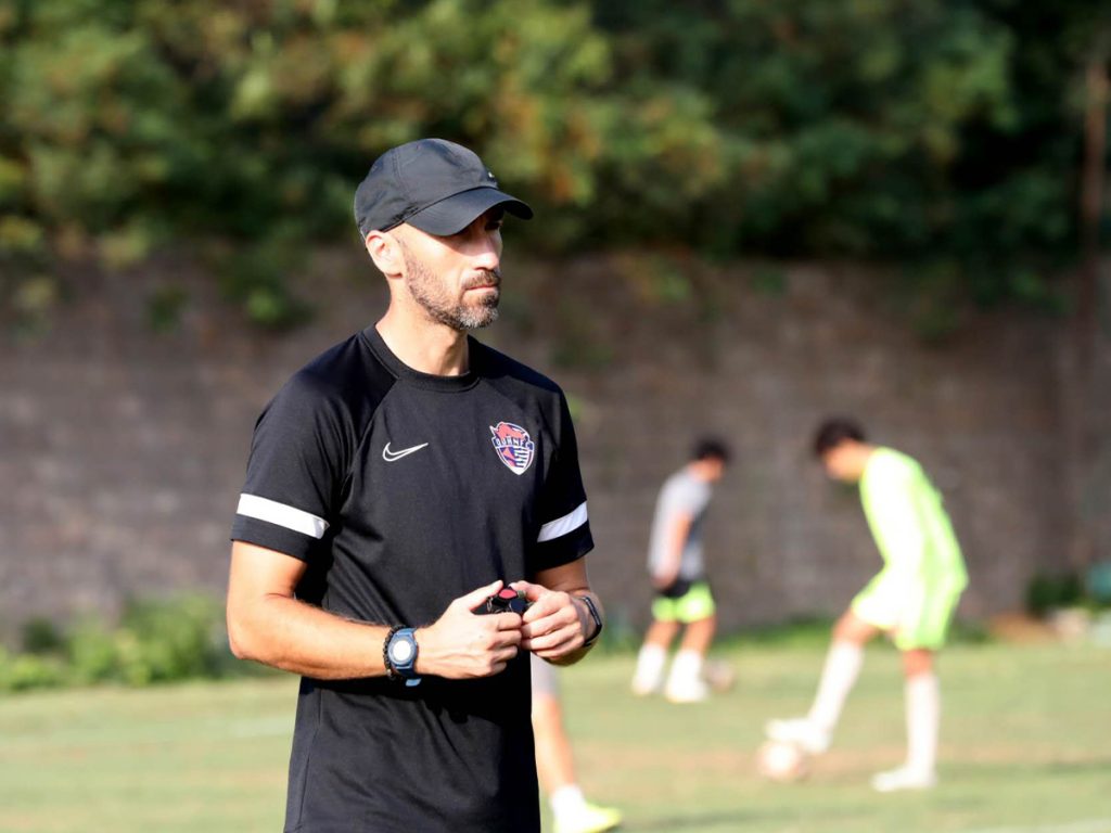 Montenegro coach Predrag Jaredic conducts training for Chinese Super League side Qingdao Hainlu FC Under 21 side.