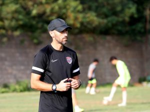 Home 10 Montenegro coach Predrag Jaredic conducts training for Chinese Super League side Qingdao Hainlu FC Under 21 side.